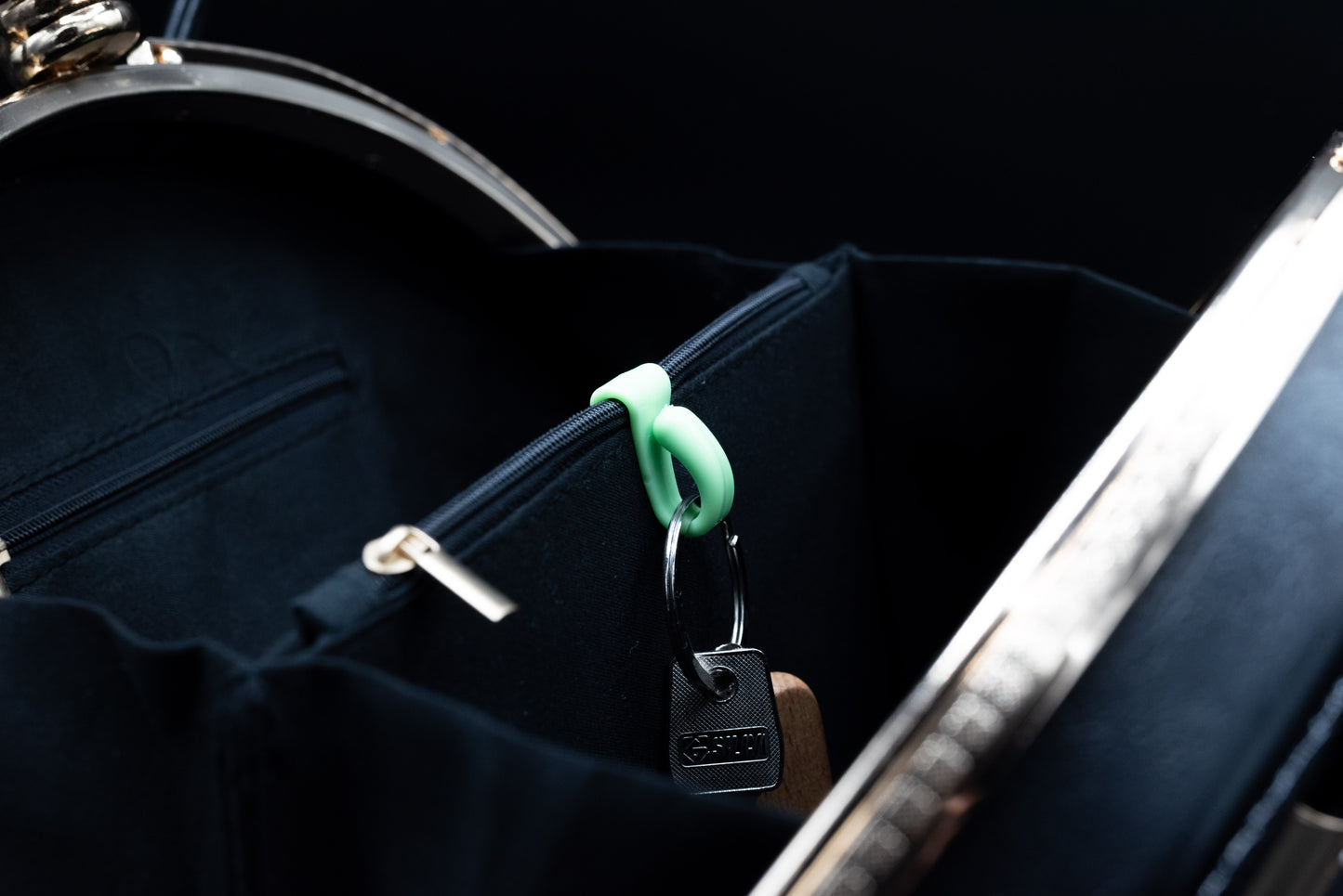 Crochet à clés portatif pour sacs