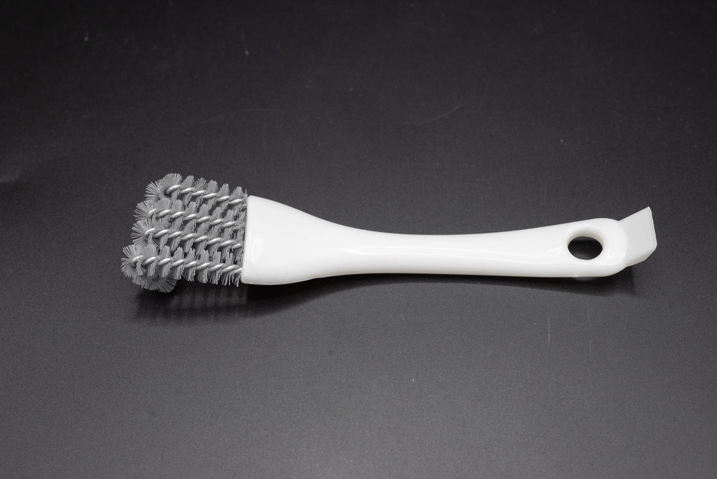 Brosse de nettoyage pour grille