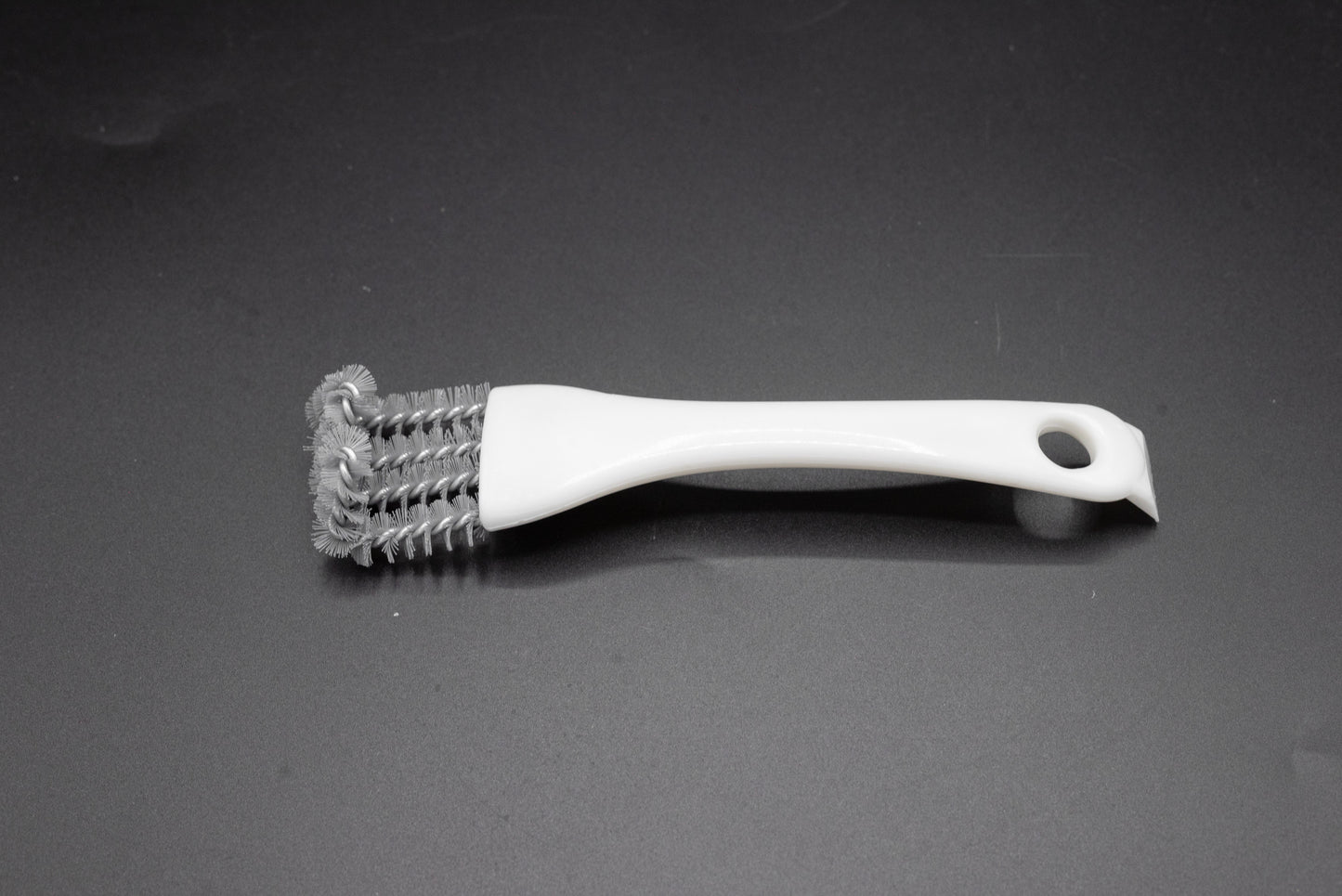 Brosse de nettoyage pour grille